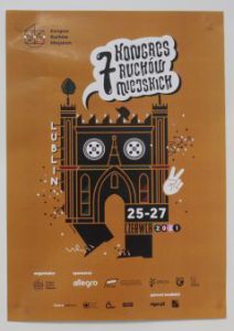 Plakat z napisem: “7 Kongres Ruchów Miejskich”. Pod spodem grafika Zamku w Lublinie.