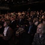 Publiczność zgromadzona na widowni w Sali Konferencyjnej Centrum Spotkania Kultur.