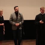 Na scenie stoją od lewej: Pani Małgorzata Malczuk – Dyrektor Powiatowego Centrum Pomocy Rodzinie w Białej Podlaskiej, Pan Michał Litwiniuk – Prezydent Miasta Biała Podlaska, ks. Paweł Zazuniak – Dyrektor Caritas Diecezji Siedleckiej