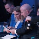 Siedząca na widowni Anna Brzyska (Dyrektor Departamentu Zarządzania Regionalnym Programem Operacyjnym Urzędu Marszałkowskiego Województwa Lubelskiego) w towarzystwie Jarosława Stawiarskiego (Marszałek Województwa Lubelskiego)