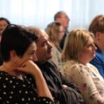 Siedzący na widowni Pracownicy Oddziału Lubelskiego PFRON