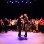 Ogłoszenie wyników II etapu eliminacji regionalnych, na scenie stoi Laureat I miejsca w kategorii SOLISTA - Szymon Woźniak z Warsztatów Terapii Zajęciowej PSONI w Świdniku