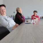 Trzy Panie siedzące przy stole