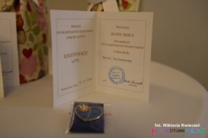 Odznaka "Złote Serce" i legitymacja Pani Marty Buczkowskiej