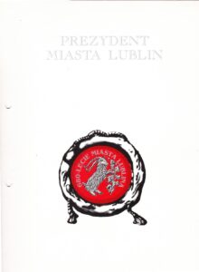 Skan okładki dokumentu "Porozumienie o współpracy między samorządem lokalnym a organizacjami pozarządowymi"; w górnej części centralnie umieszczony napis "Prezydent Miasta Lublin" a w dolnej części pieczęć z napisem "680-lecie Miasta Lublina" oraz wizerunkiem umieszczonego w czerwonym polu zwróconego w prawo srebrnego kozła wspinającego się na krzak winorośli